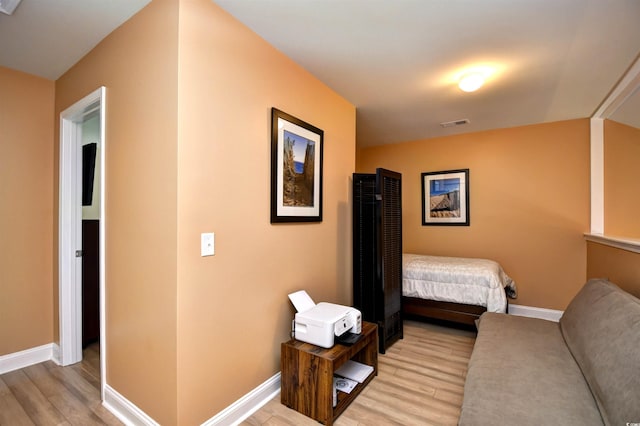 bedroom featuring light wood-type flooring