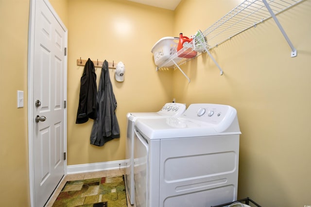 washroom featuring washer and dryer