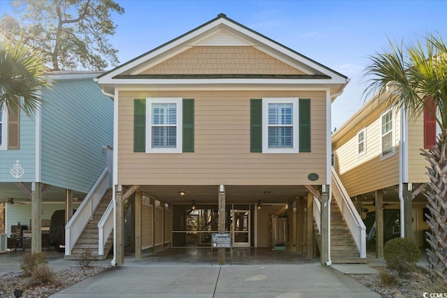 beach home featuring a carport