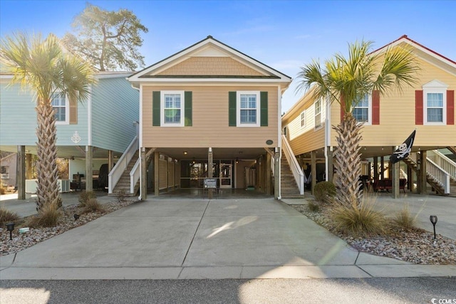 coastal home featuring a carport