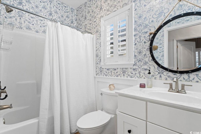 full bathroom featuring vanity, toilet, and shower / bathtub combination with curtain