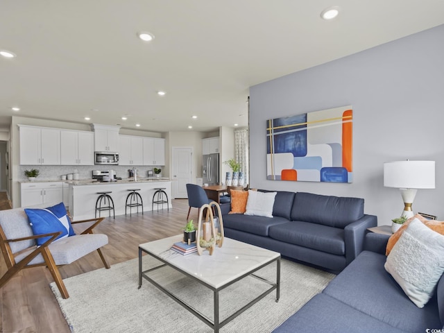 living room featuring light wood-type flooring