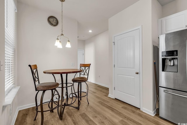 801 San Marco Ct Unit C, Myrtle Beach, SC 29579 - dining room featuring light wood-style floors, baseboards, a chandelier, and recessed lighting