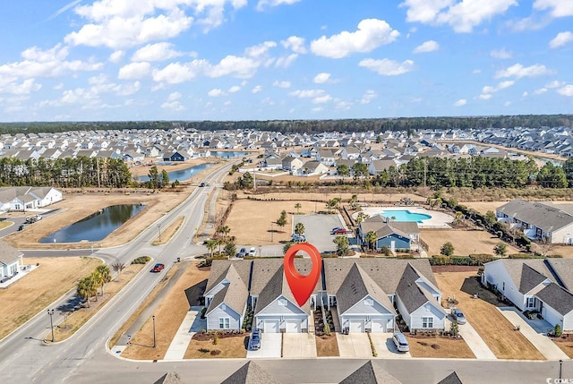 bird's eye view featuring a water view