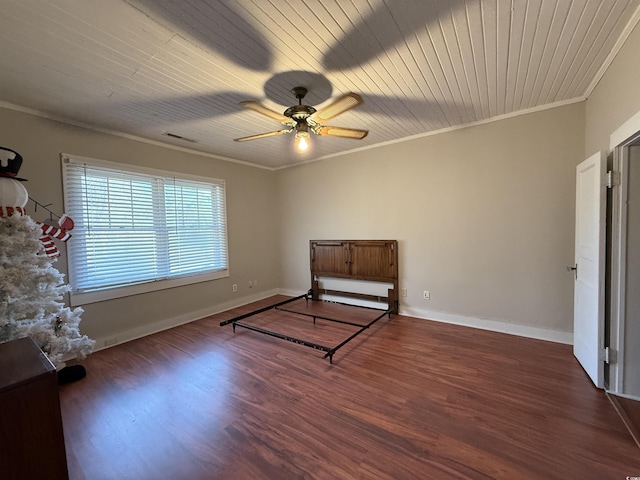 unfurnished bedroom with crown molding, dark wood-type flooring, wooden ceiling, and ceiling fan