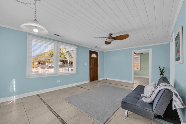 living room featuring crown molding, ceiling fan, wooden ceiling, and light tile patterned floors