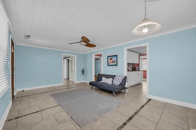 interior space with crown molding, plenty of natural light, and light tile patterned floors