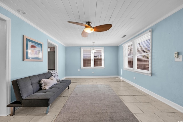 sitting room featuring wood ceiling, light tile patterned floors, and crown molding