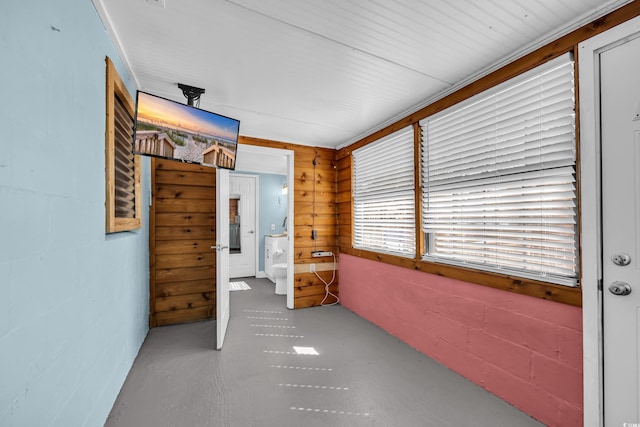 hallway featuring concrete floors