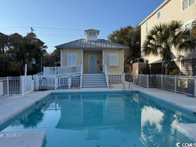 view of pool featuring an outdoor structure