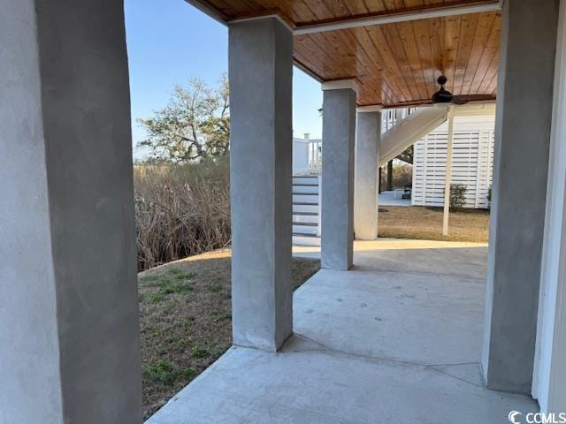 view of patio featuring ceiling fan