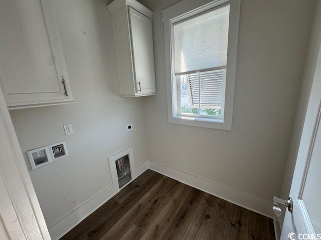 laundry room featuring dark wood-type flooring, baseboards, cabinet space, electric dryer hookup, and washer hookup