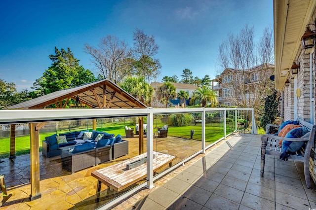 view of patio / terrace featuring an outdoor living space and a gazebo