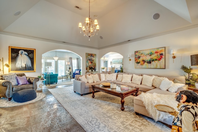 living room featuring a tray ceiling, a chandelier, and high vaulted ceiling