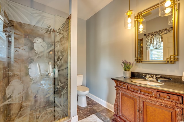 bathroom featuring vanity, tile patterned floors, a shower with door, and toilet