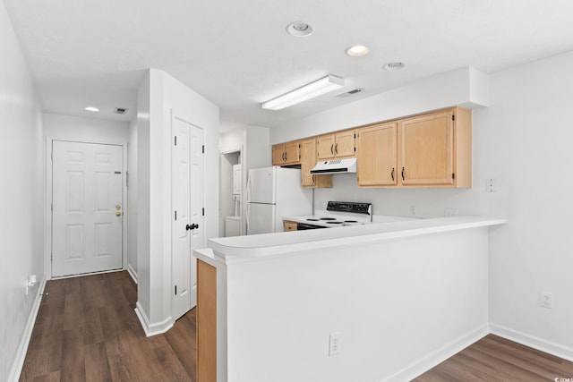 kitchen featuring white appliances, dark hardwood / wood-style floors, kitchen peninsula, and light brown cabinets