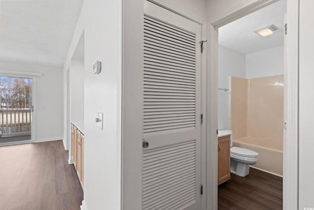 hall featuring dark hardwood / wood-style floors