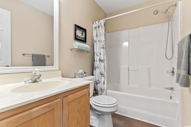 full bathroom with vanity, shower / tub combo, wood-type flooring, and toilet