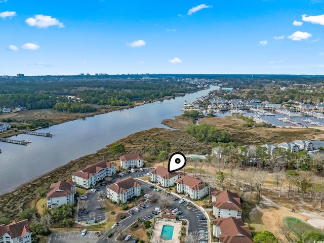 birds eye view of property featuring a water view