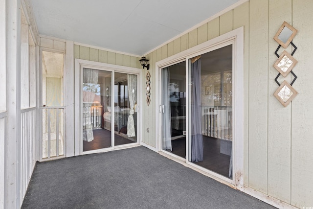 unfurnished sunroom with a wealth of natural light