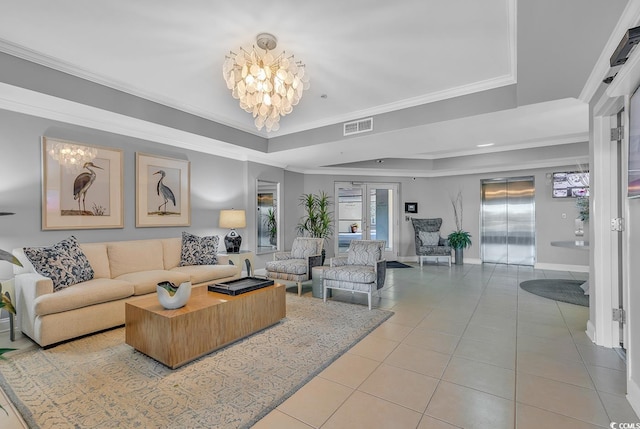 living area featuring visible vents, light tile patterned floors, elevator, and an inviting chandelier