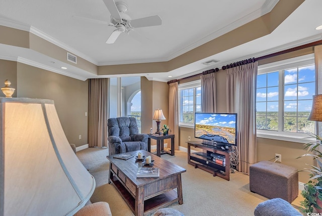 living area with crown molding, baseboards, light carpet, and visible vents