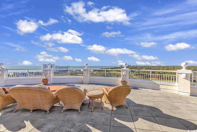 view of patio / terrace featuring a water view
