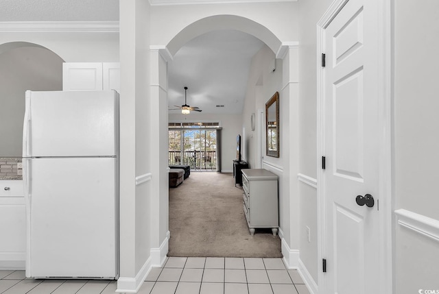 hallway with light colored carpet