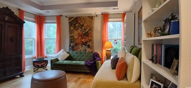 sitting room featuring a healthy amount of sunlight and light wood-type flooring