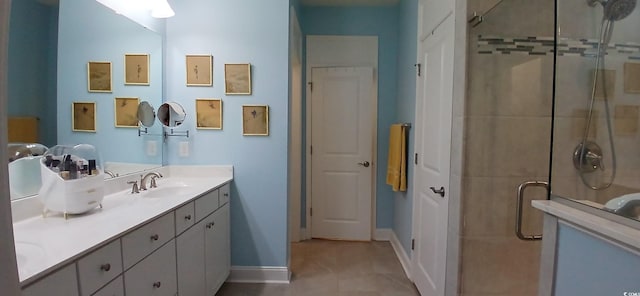 bathroom with walk in shower and vanity