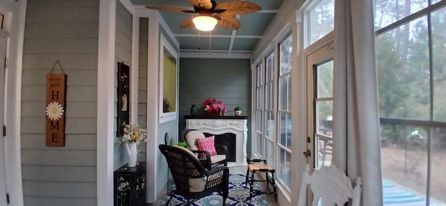 sunroom / solarium with ceiling fan