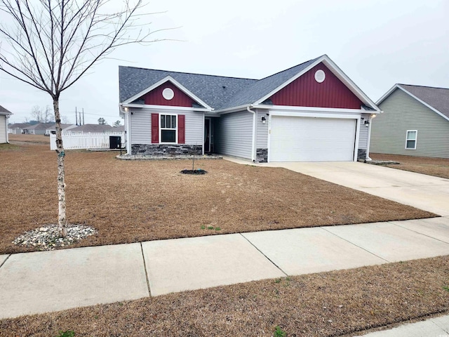 ranch-style home with a garage