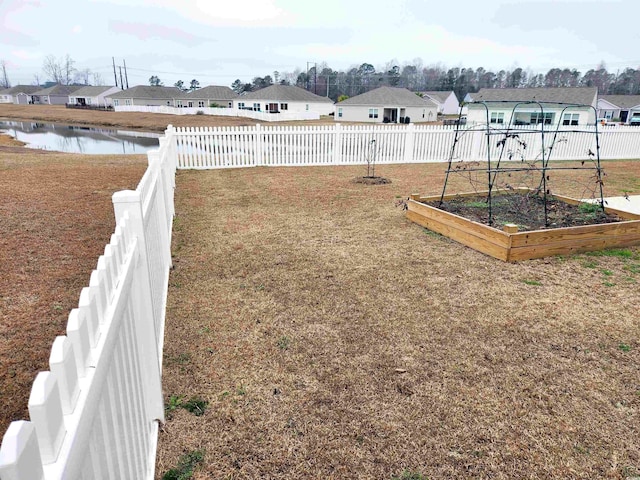 view of yard with a water view