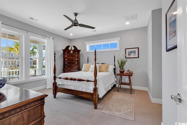 bedroom with light carpet and ceiling fan