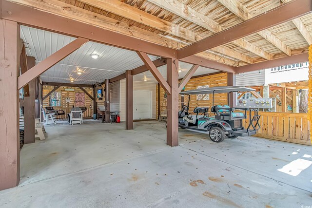 6001-1383 S Kings Hwy, Myrtle Beach, SC 29575 - view of patio featuring a garage and a carport