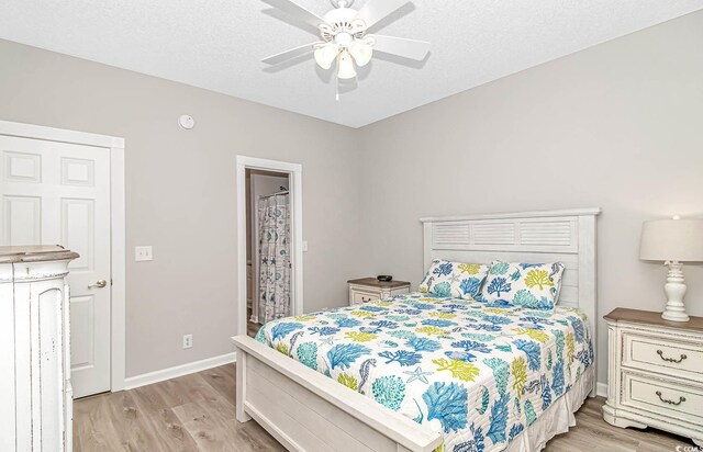6001-1383 S Kings Hwy, Myrtle Beach, SC 29575 - bedroom with a ceiling fan, baseboards, light wood-style flooring, and a textured ceiling