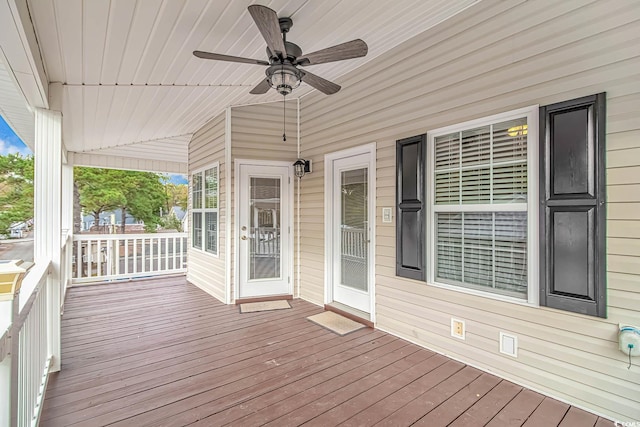 wooden deck with ceiling fan