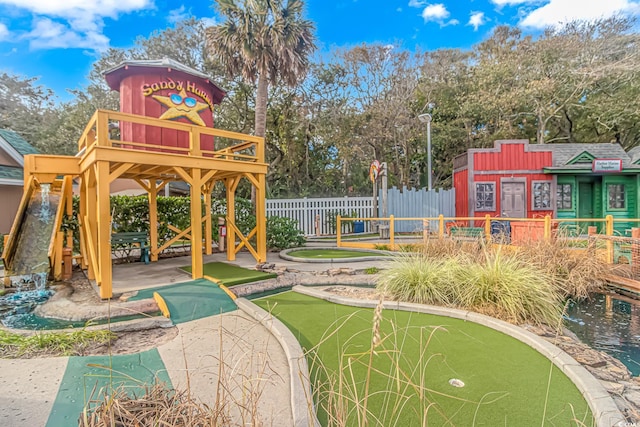 view of home's community featuring a patio and fence