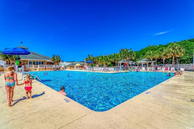 6001-1383 S Kings Hwy, Myrtle Beach, SC 29575 - pool with a gazebo, fence, and a patio area