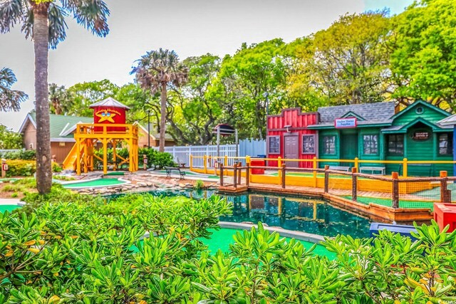 6001-1383 S Kings Hwy, Myrtle Beach, SC 29575 - view of community with a swimming pool, fence, and a jacuzzi