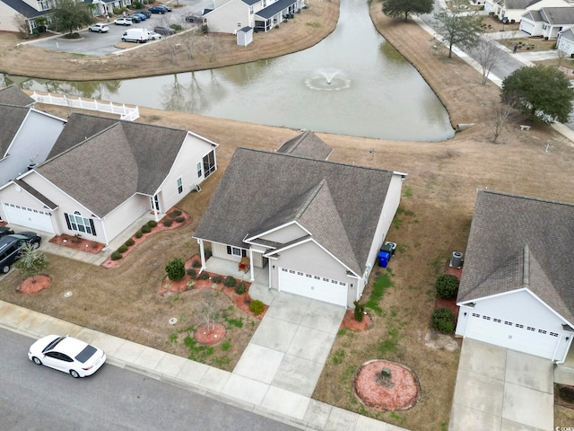 drone / aerial view featuring a water view