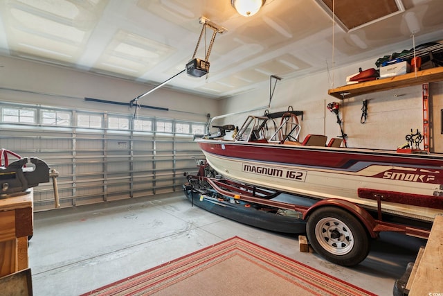 garage featuring a garage door opener