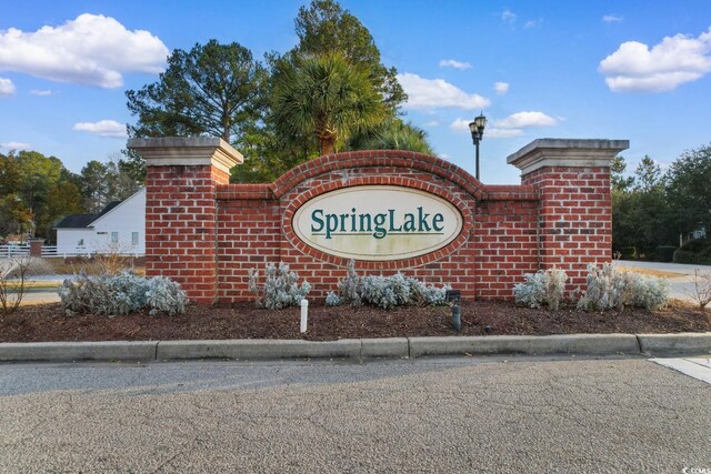 view of community sign