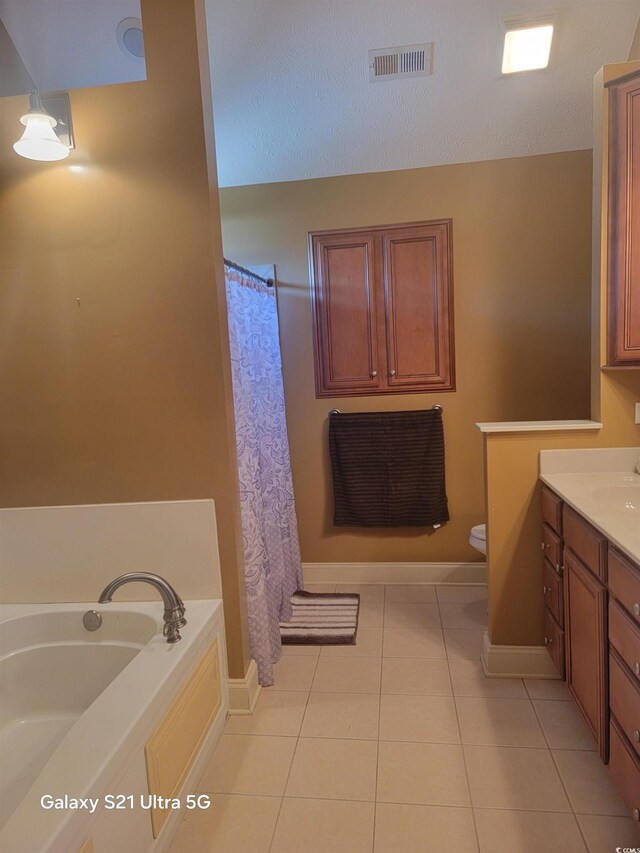 153 Highmeadow Ln, Aynor, SC 29511 - bathroom with a garden tub, baseboards, toilet, tile patterned flooring, and vanity