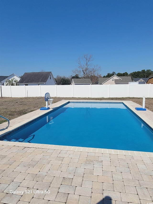 view of pool featuring a fenced backyard and a fenced in pool