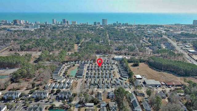 aerial view featuring a water view and a city view