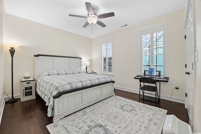 1188 Peterson St, Myrtle Beach, SC 29577 - bedroom with wood finished floors, baseboards, and ceiling fan