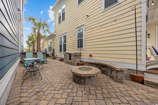 1188 Peterson St, Myrtle Beach, SC 29577 - view of patio with an outdoor fire pit