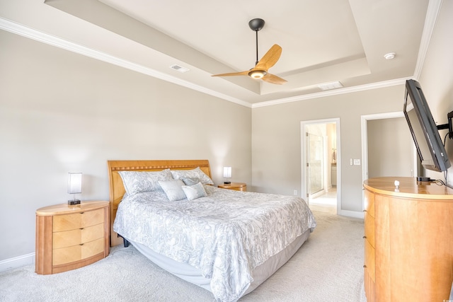 carpeted bedroom with crown molding, ceiling fan, and a tray ceiling