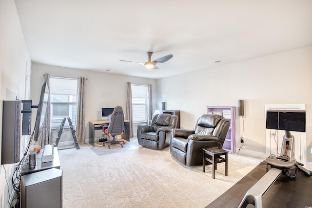 living room with ceiling fan and light carpet